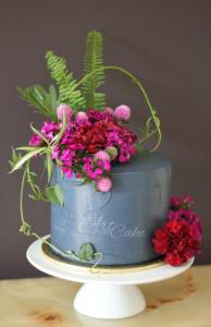 Concrete cake with fresh flowers