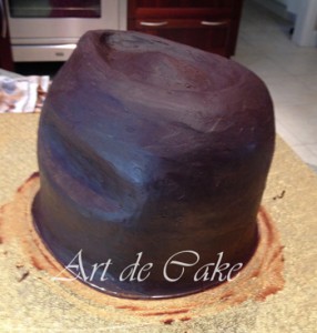 Cowboy hat cake carved and ganached      
